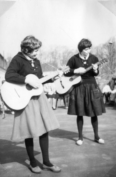 Jutta and another Girl Scout Playing the Guitar