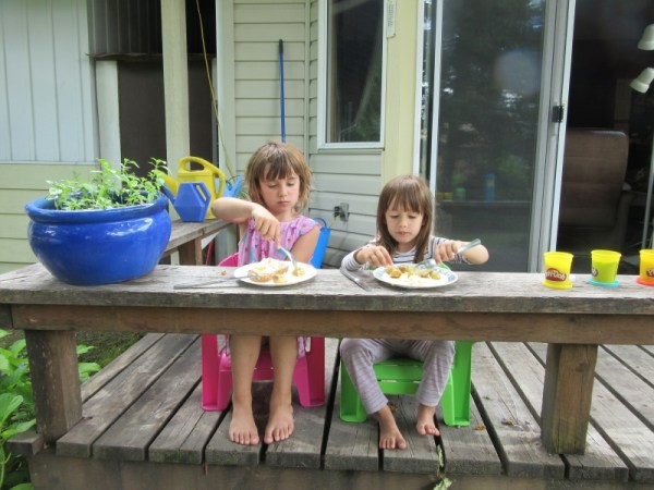 Azure and Emeline Eating a Snack on our Deck