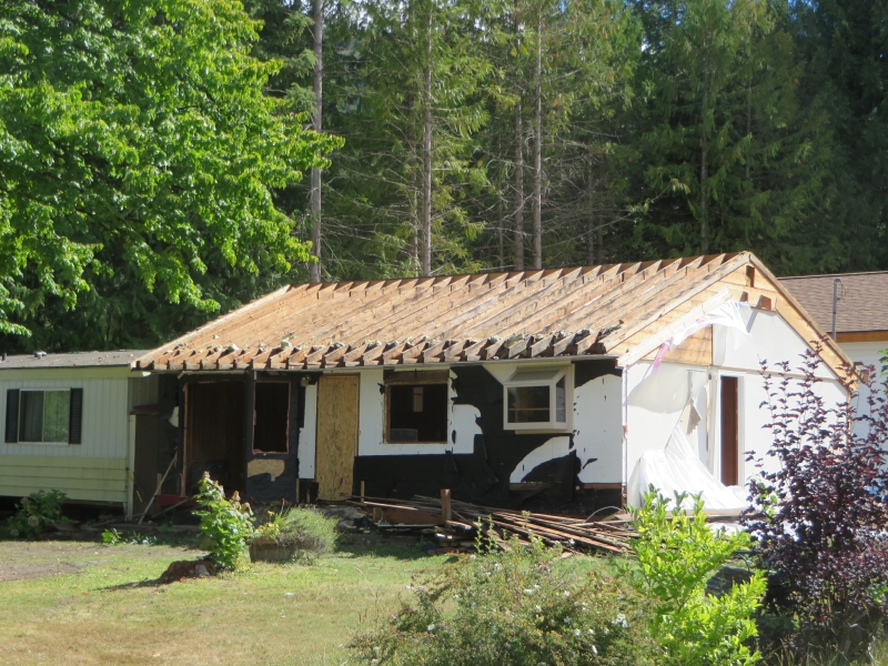 5-the-metal-roof-of-the-old-house-is-gone
