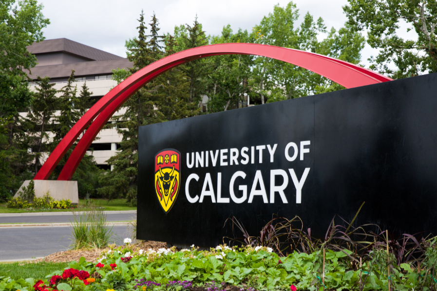 Campus sign by the arch with the new logo. 2016
